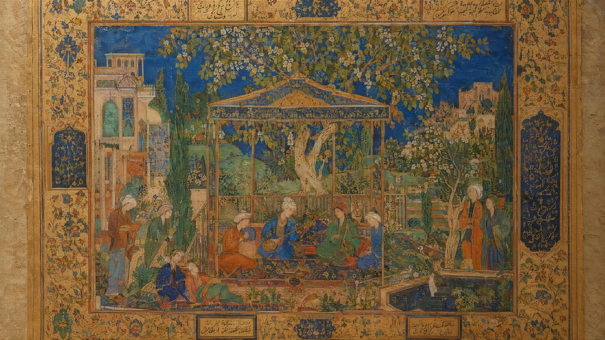 A Persian-style miniature painting enlarged, gold filigree, tiny faces and paper grain intact. (detail)