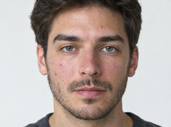 Close-up portrait of a man with natural skin texture and blemishes