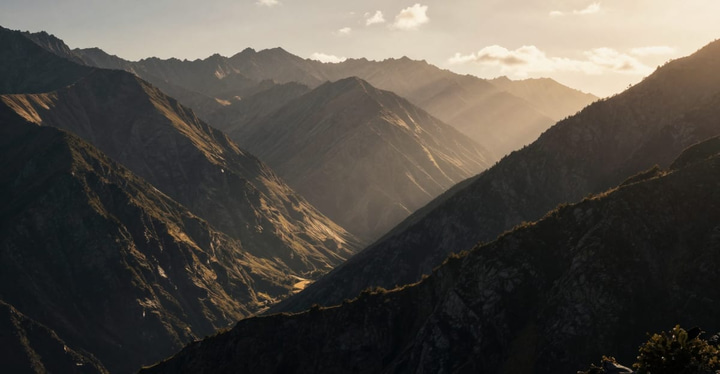 Mountain ridges in warm cinematic light, illustrating a film-style look for AI video