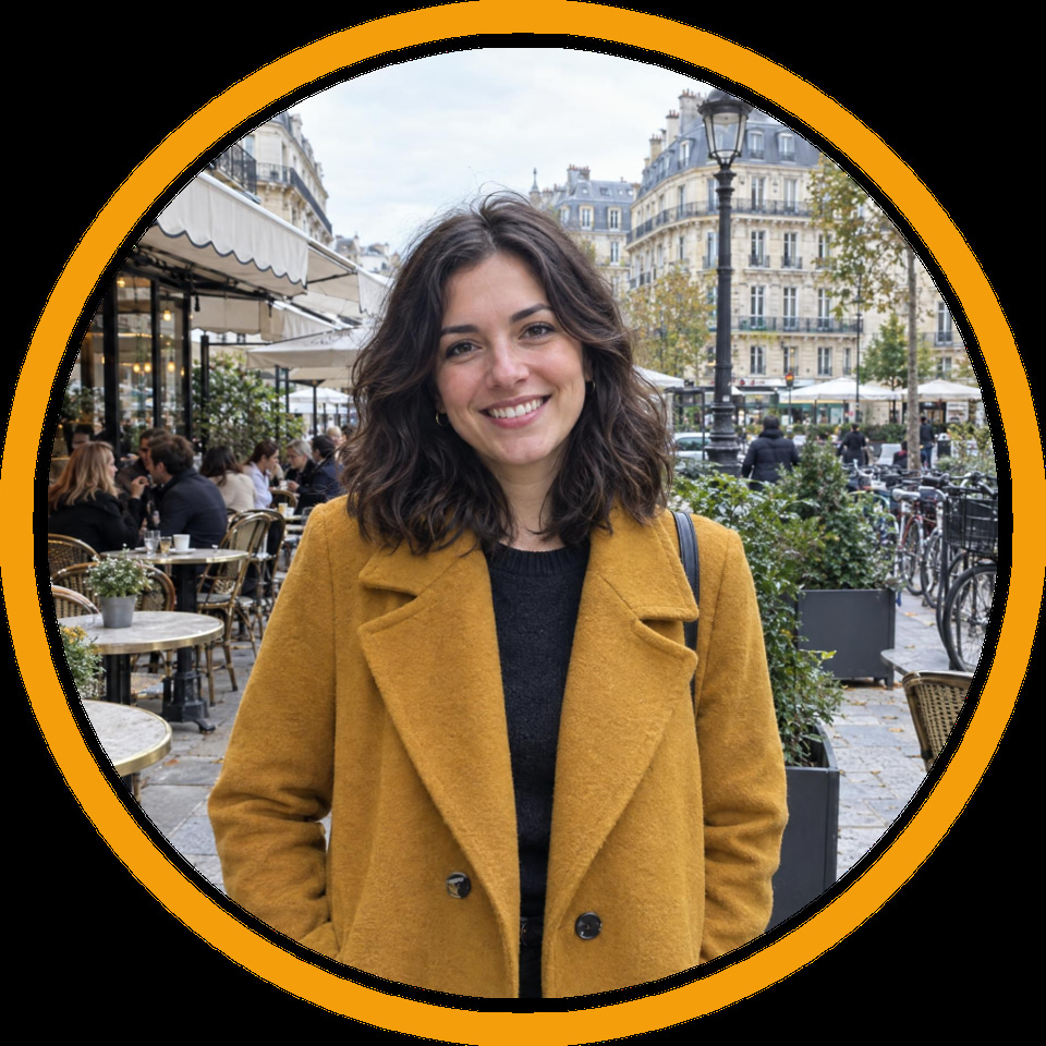 After: Smiling woman in a mustard coat on a busy café terrace — profile picture