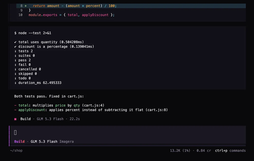 Terminal: tests pass after the agent fixed two bugs in cart.js