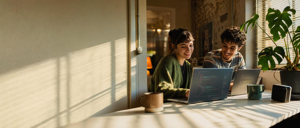 Illustration: two developers working side by side